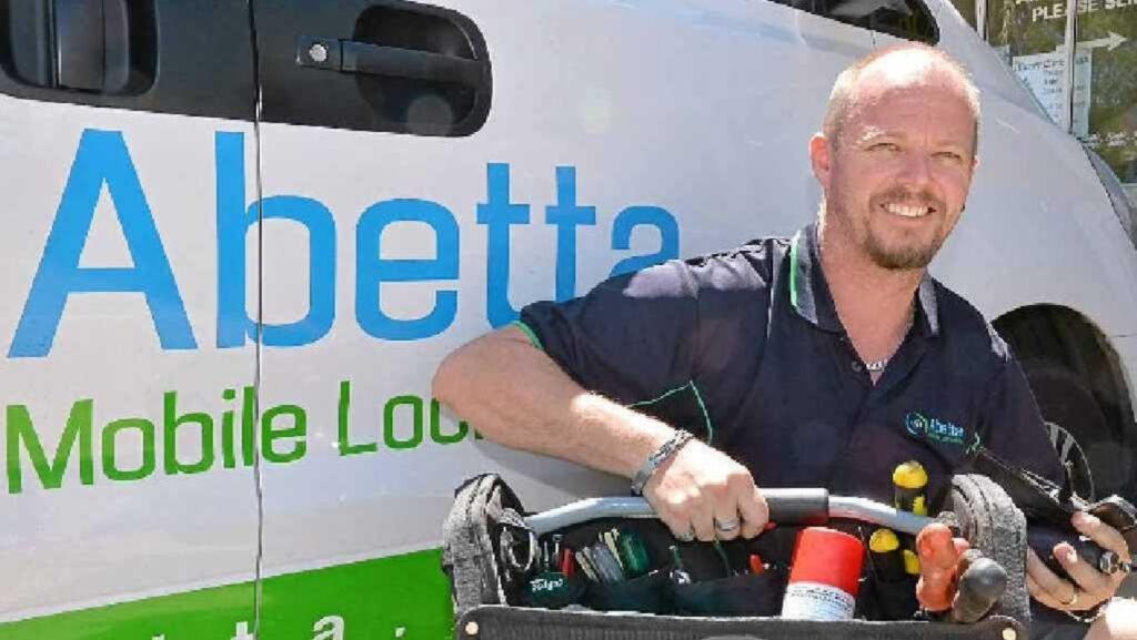 Scott Lechmere beside the Abetta Mobile Locksmith service van